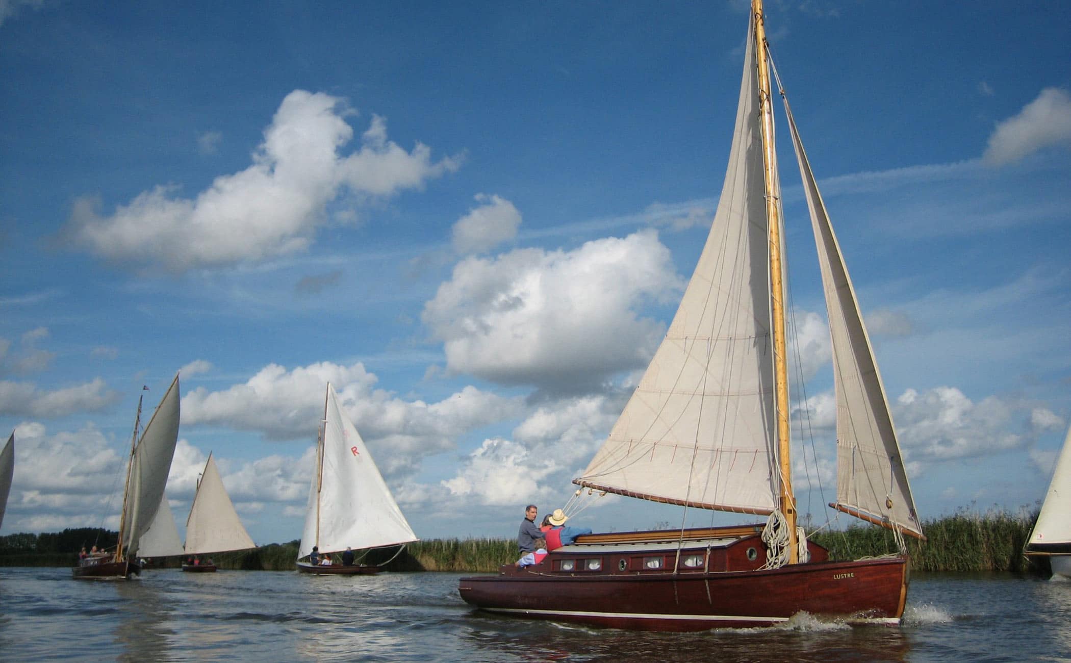 The Lullaby class Lucent a traditional wooden sailing cabin yacht on the Norfolk Broads.