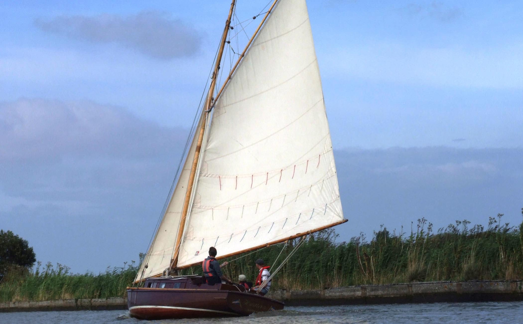Norfolk Broads sailing on traditional wooden cabin yachts