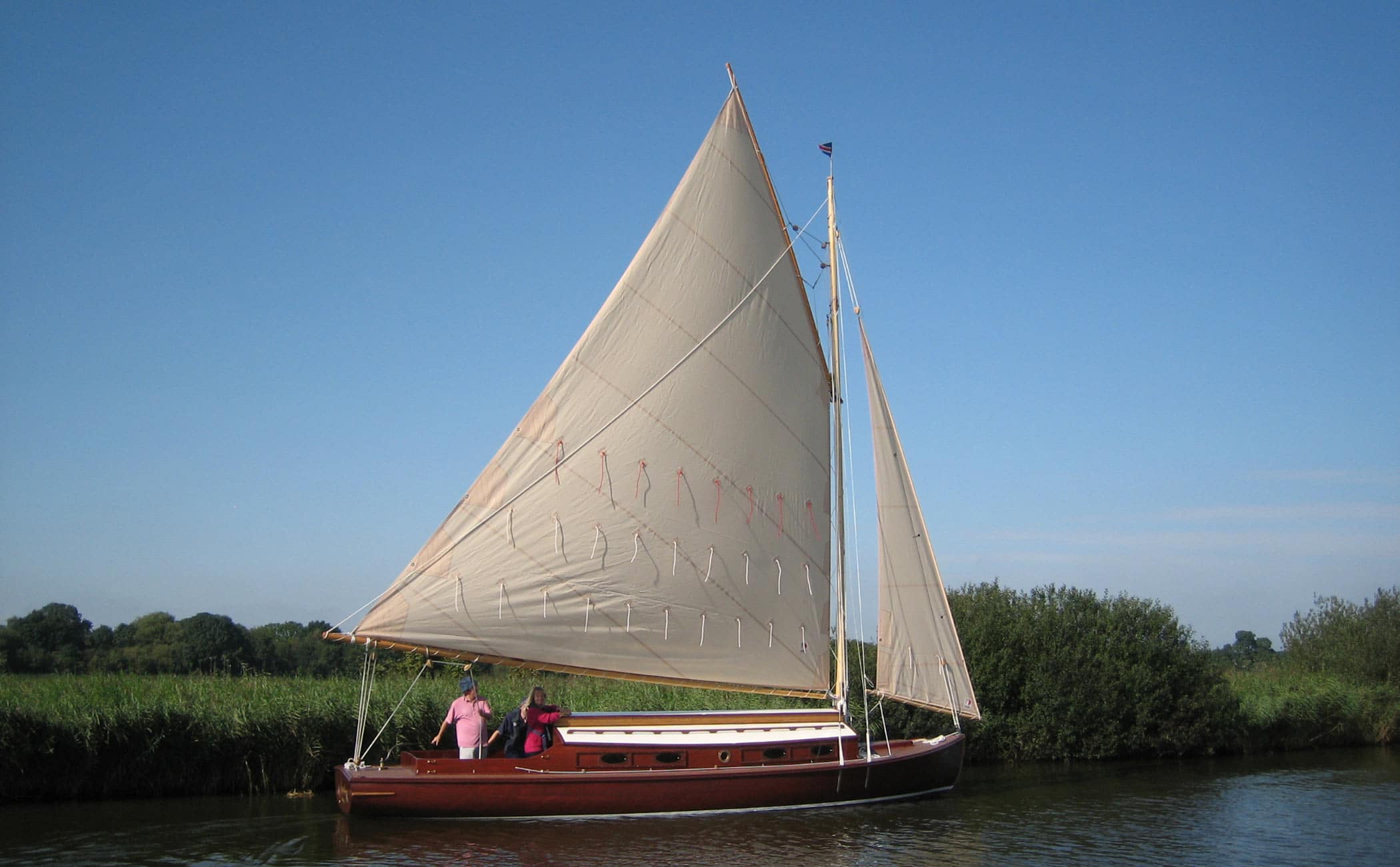 Lucent, the traditional Norfolk Broads Lullaby class cabin yacht sailing on the Norfolk Broads.